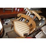 A barbers type tub chair with adjustable headrest;