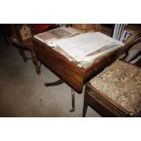 An antique mahogany drop leaf sofa table fitted en