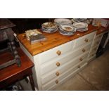 A part painted pine chest fitted two short over th