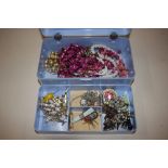 A jewellery box and contents to include bead neckl
