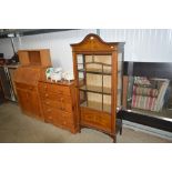 An Edwardian inlaid display cabinet with arched pe
