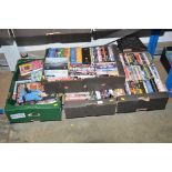 Four boxes of DVDs; videos etc