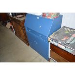 A blue painted bureau