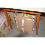 A box of curtains and tie backs