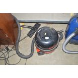 A Henry cylinder hoover