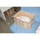A box containing lace table clothes etc.