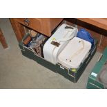 A box containing two vanity cases and a quantity o