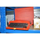 A modern Valentine cased portable typewriter