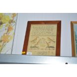 A framed and glazed print of a sampler dated for 1