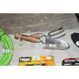 A stainless steel trowel and fork (23)