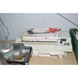 A "compass expert" 320 laminator and various lamin