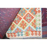 A 4'2" x 2'6" vegetable dye Chobi Kelim rug