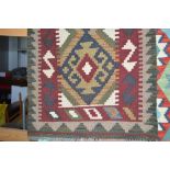 An approx 2'10" x 2' Maimana Kelim rug