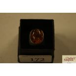 A silver and amber dress ring