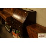 A reproduction mahogany bureau