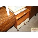 A teak bedside cabinet