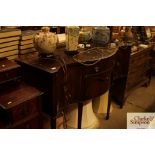 A mahogany serpentine fronted sideboard