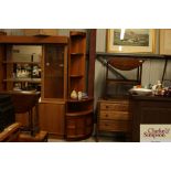 A pair of Nathan teak corner cupboards