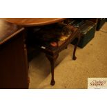 An oak framed dressing table stool with needlepoin