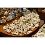 A large quantity of crested souvenir china
