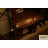 An oak nest of occasional tables