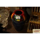 A Poole Pottery multi colour baluster vase