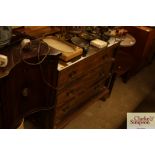 An oak chest of three long drawers