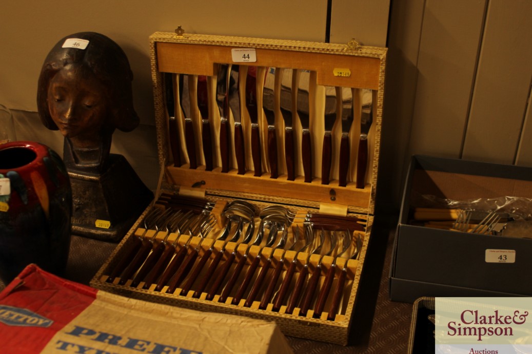 A canteen of 36 piece of vintage cutlery