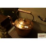 An antique copper kettle