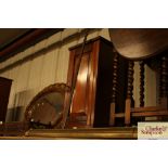 An Edwardian walnut bedside cabinet