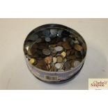 A tin of various coinage