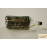A ship in a bottle ornament