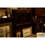 An old charm oak and leaded glazed cabinet