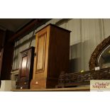 An Edwardian satin walnut bedside cupboard