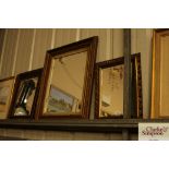 Three decorative gilt framed wall mirrors