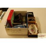 Two watches; various tins; miniature Monopoly game