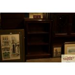 A mahogany open fronted bookcase