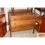 A 1930's oak chest of three long drawers