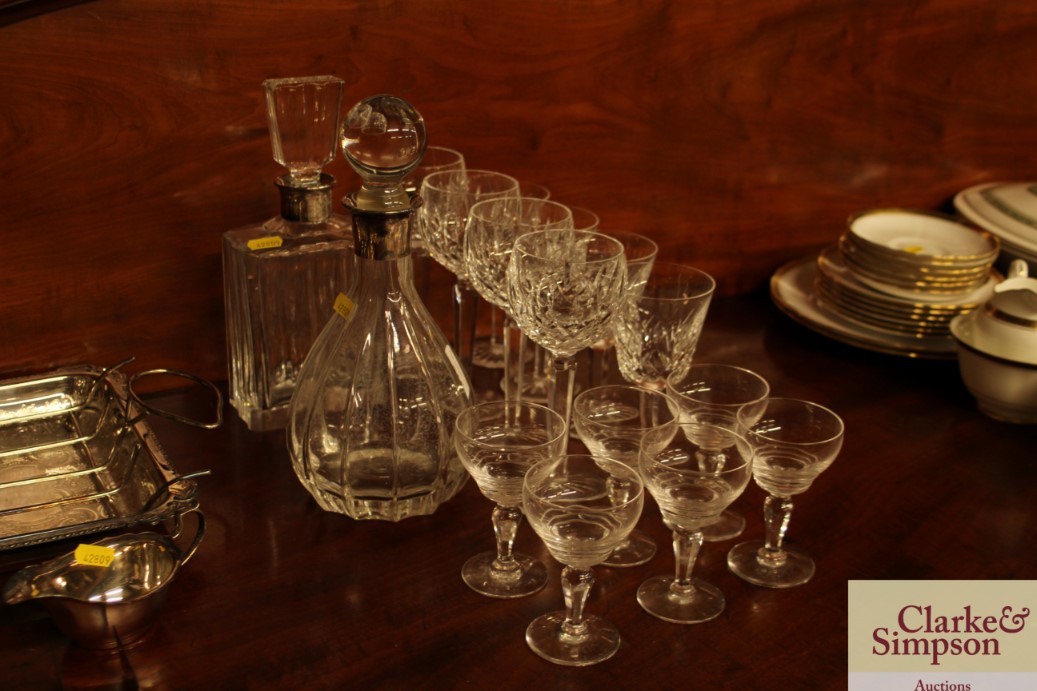 Two silver mounted decanters and a quantity of gla