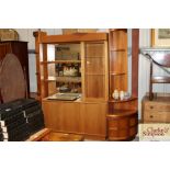 A Turnidge of London teak display cabinet