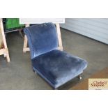 A blue upholstered nursing chair