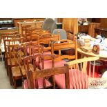 Five mahogany ladder back dining chairs