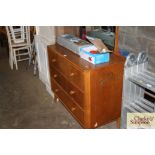 A Meredew teak dressing chest fitted three long dr