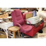 A purple upholstered swivel office chair