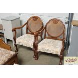 Pair of mahogany and rattan backed arm chairs rais