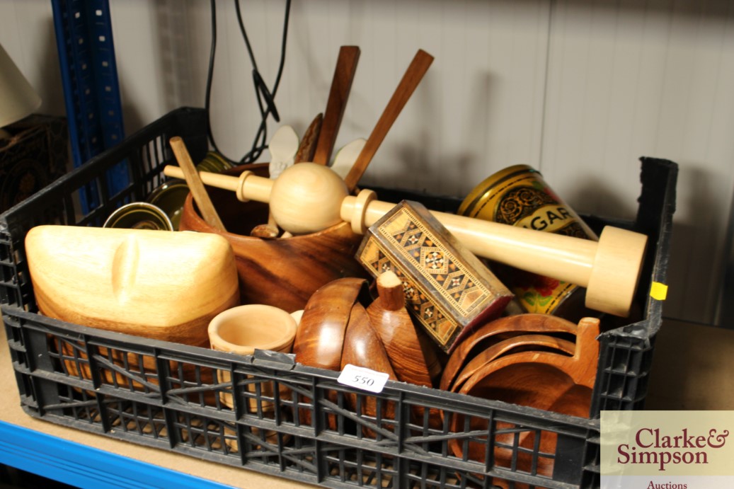 A box containing various wooden items; ramekins et