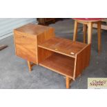 A teak side cabinet