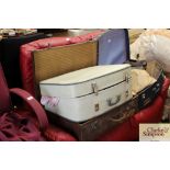 A suitcase and contents of various clothes etc