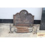 A cast iron fire back and fire grate; and a pair o