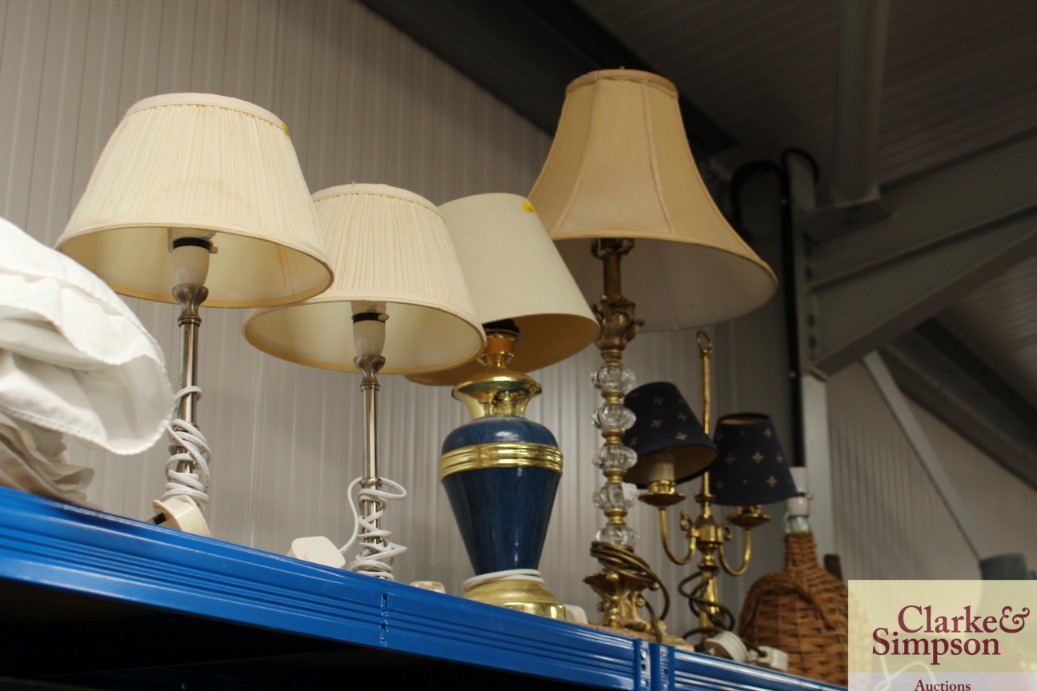 A pair of modern table lamps together with three o